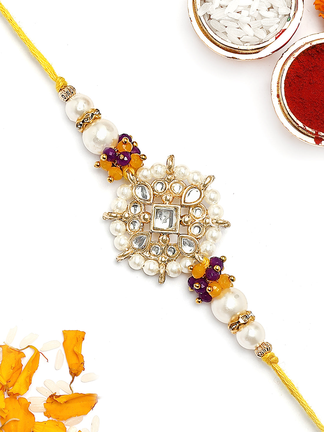 KARATCART Gold Plated Yellow and Blue Floral Kundan Bhaiya Rakhi with Roli & Chawal