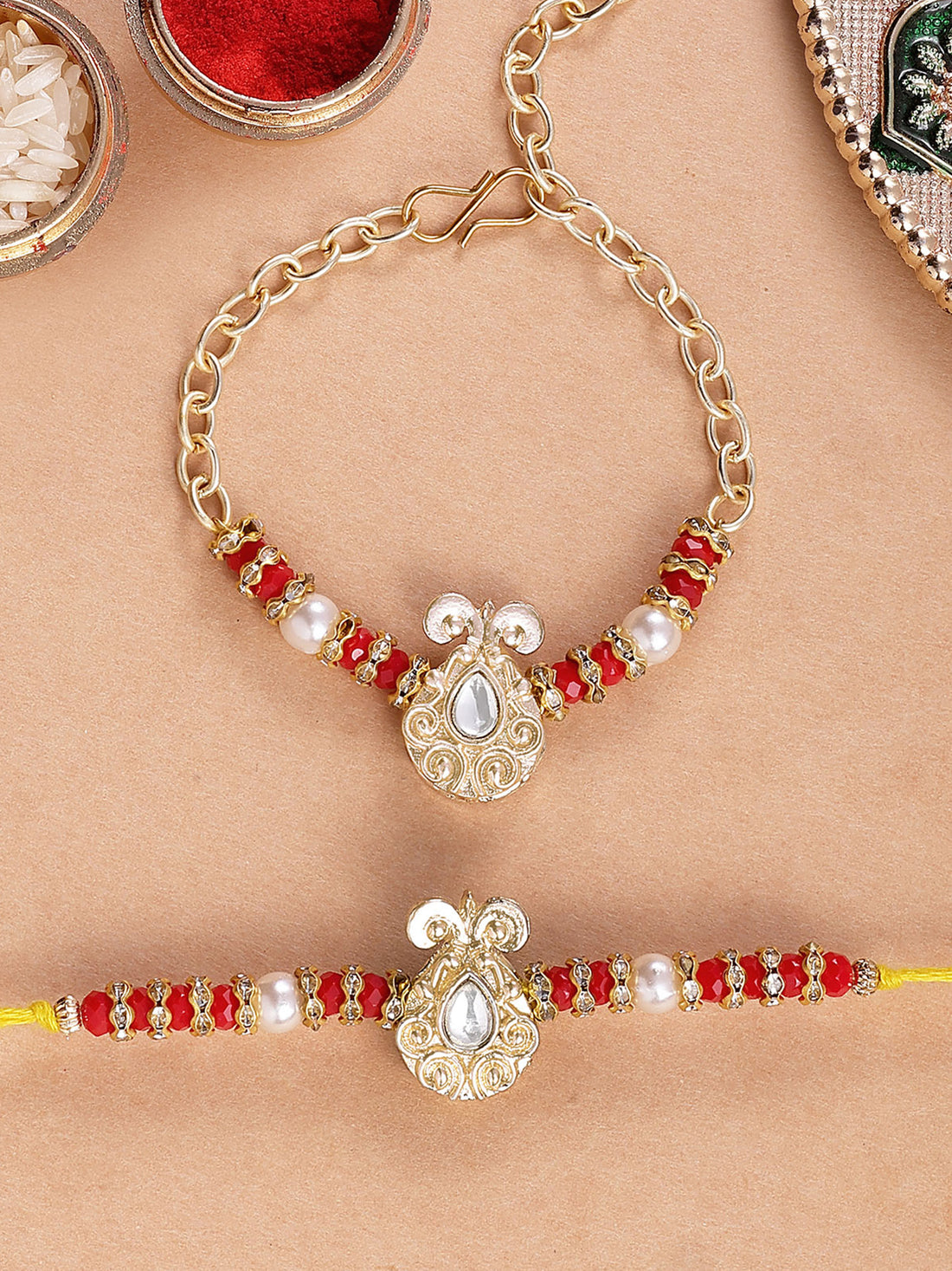 Karatcart Gold Plated Red Beads Kundan Bhiya Bhabhi Rakhi with Roli & Chawal