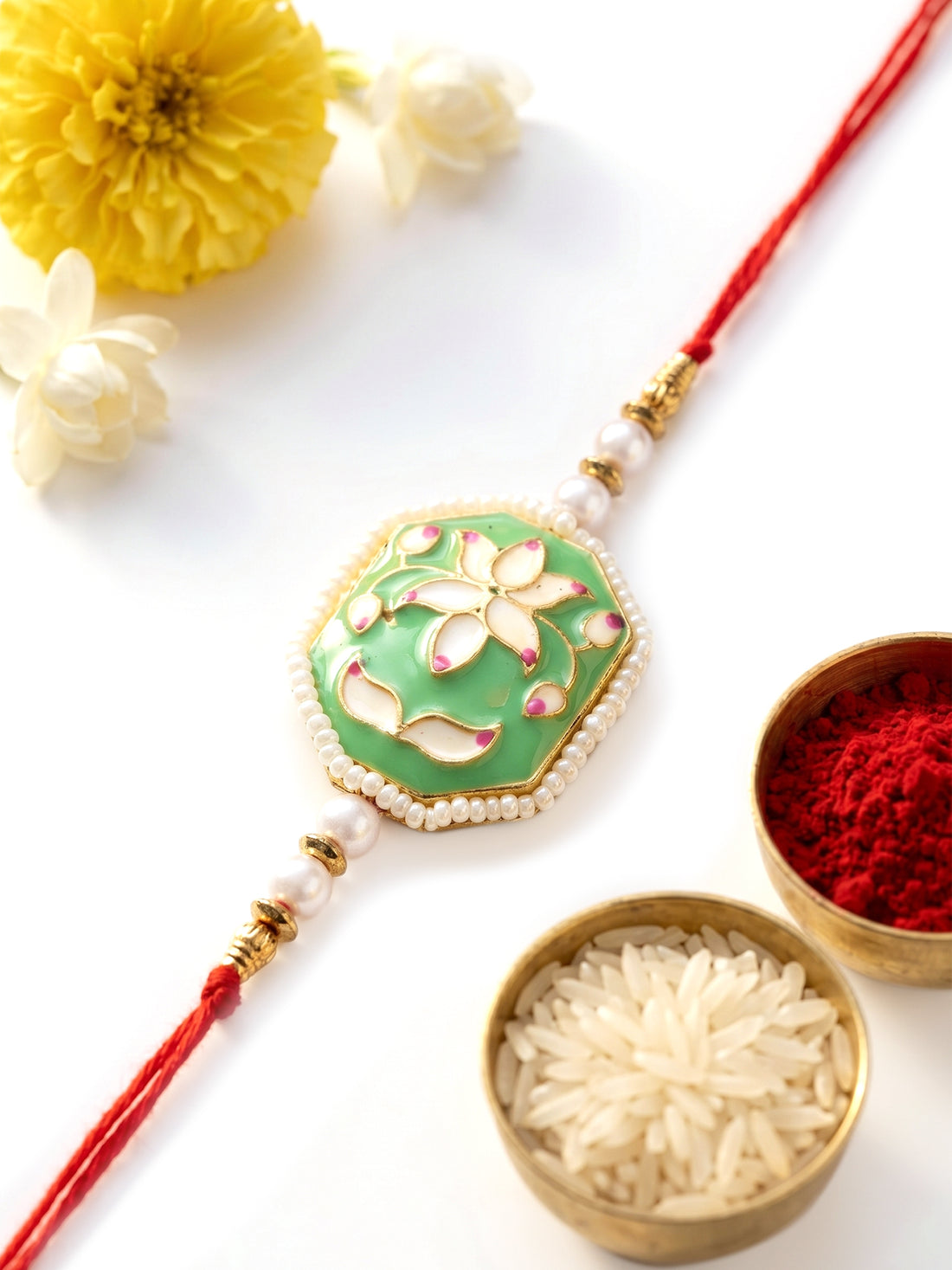 KARATCART Vibrant Light Green Meenakari Lotus Design Handmade Rakhi for Brother with Roli Chawal