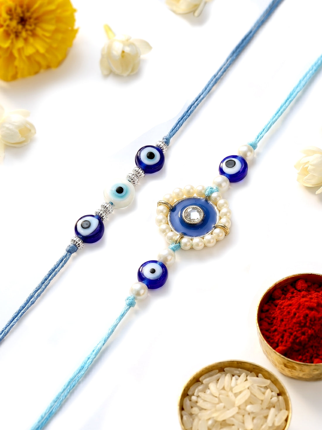 KARATCART Set of 2 Blue Evil Eye and Pearl Handmade Kundan Rakhi for Brother with Roli & Chawal