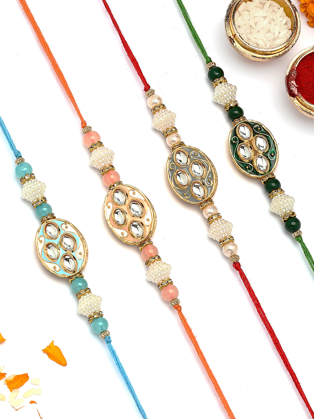 KARATCART Set of 4 Oval Floral Design Enamel Kundan Rakhi for Brother with Roli & Chawal