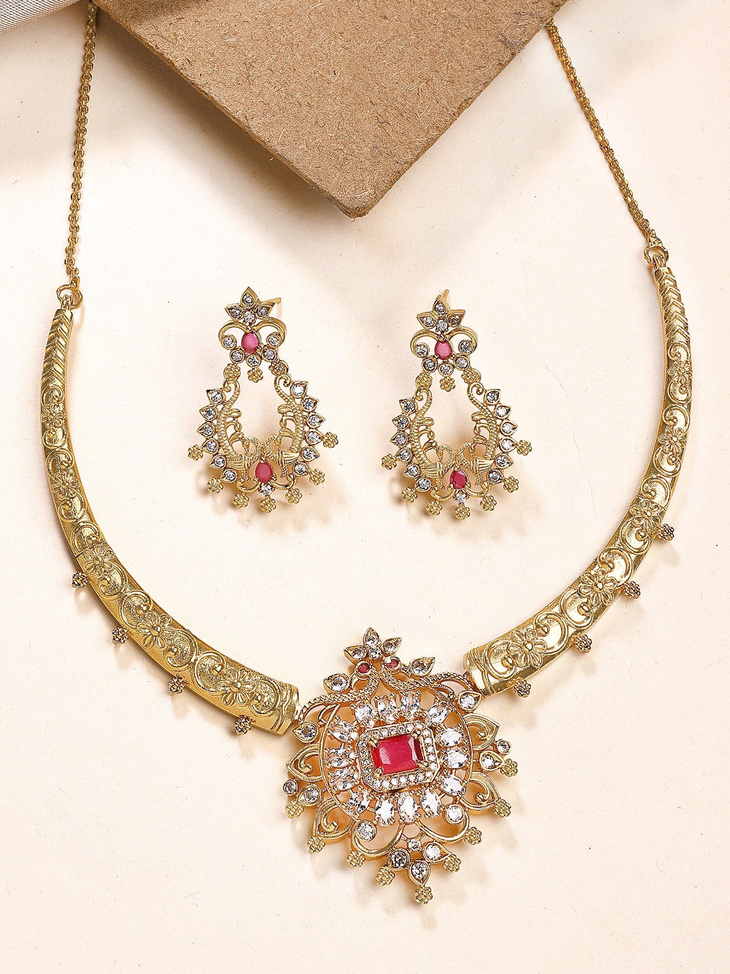 KARATCART Traditional Gold-Plated Red and Green Stones Temple Jewellery Set for Women - Image 1