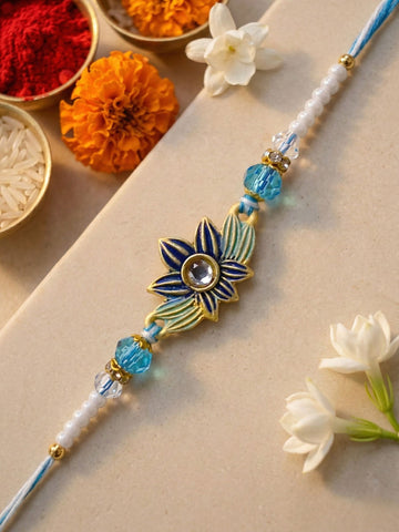 KARATCART Gold Plated Light Blue Meenakari Floral Kundan Bhaiya Rakhi with Roli & Chawal