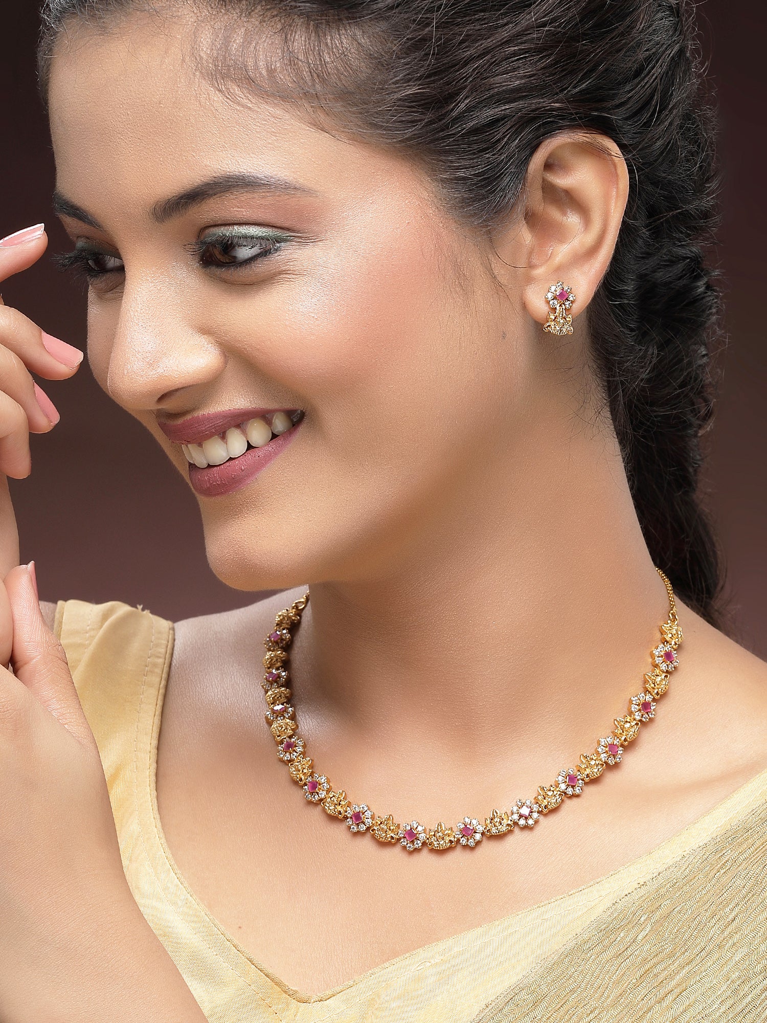 KARATCART Traditional Gold-Plated Laxmi Mata Red American Diamond Temple Jewellery Set for Women - view 2