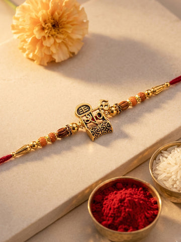 KARATCART Gold Plated Shiv Trishul Designer Bhaiya Rakhi with Roli & Chawal