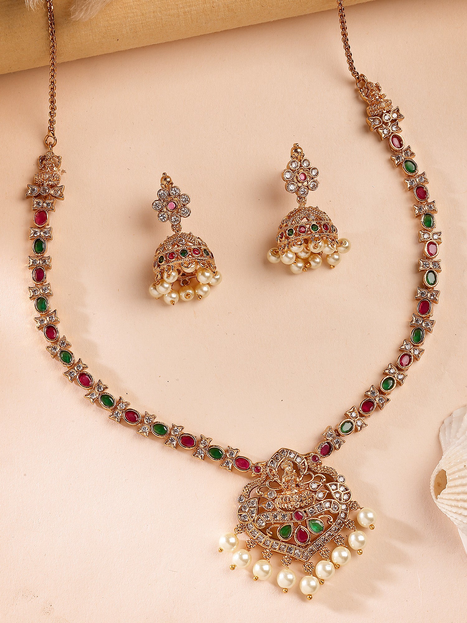 KARATCART Traditional Gold Plated Red and Green Stone Laxmi Mata Temple Jewellery Set for Women - Image 1