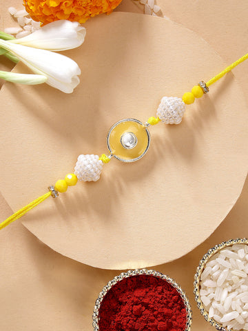 KARATCART Vibrant Yellow Meena Evil Eye Design Handmade Kundan Rakhi for Brother with Roli Chawal
