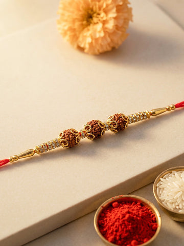 KARATCART Gold Plated Triple Rudraksha Studded Bhaiya Rakhi with Roli & Chawal