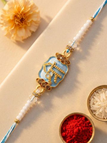 KARATCART Gold Plated Light Blue Meenakari Shree Radha Rani Bhaiya Rakhi with Roli & Chawal