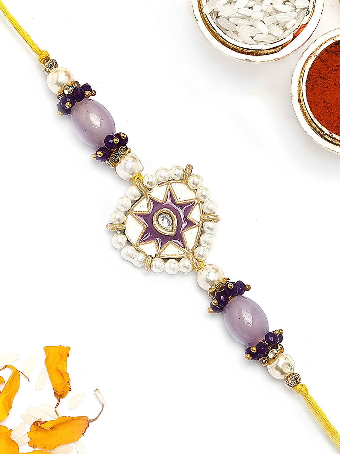KARATCART Gold Plated Purple Meena Kundan Bhaiya Rakhi with Roli & Chawal