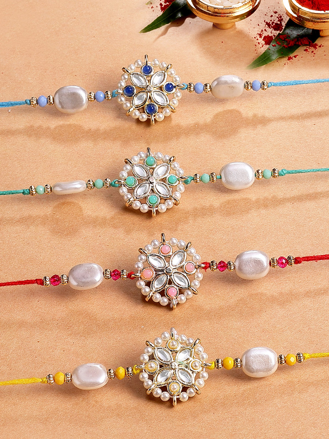 Karatcart Set of 4 Floral Design Kundan Rakhi for Brother with Roli & Chawal
