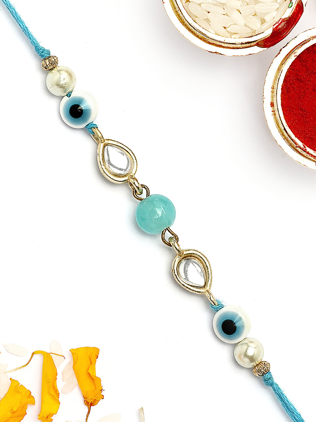 KARATCART Gold Plated Light Blue Bead Evil Eye Kundan Bhaiya Rakhi with Roli & Chawal