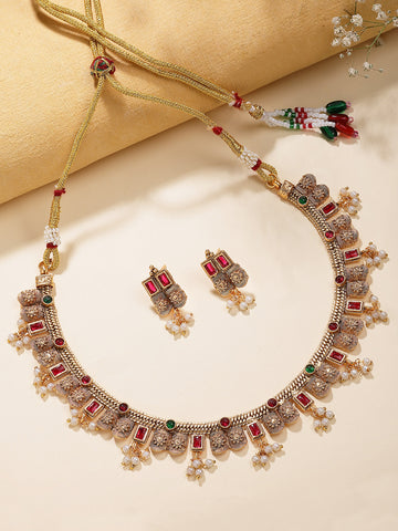 Karatcart Karatcart Gold Plated Red Stone Floral Design Temple Jewellery Necklace Set for Women
