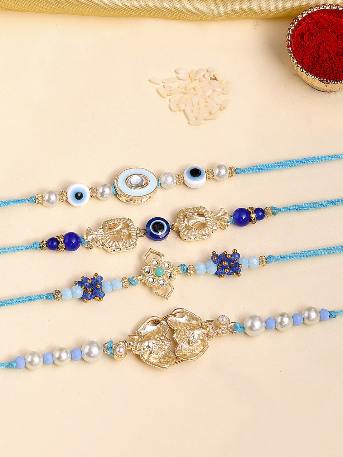Karatcart Set of 4 Blue and White Kundan Rakhi for Brother with Roli & Chawal