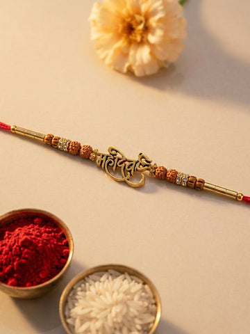 KARATCART Gold Plated Mahadev Letter Designer Bhaiya Rakhi with Roli & Chawal