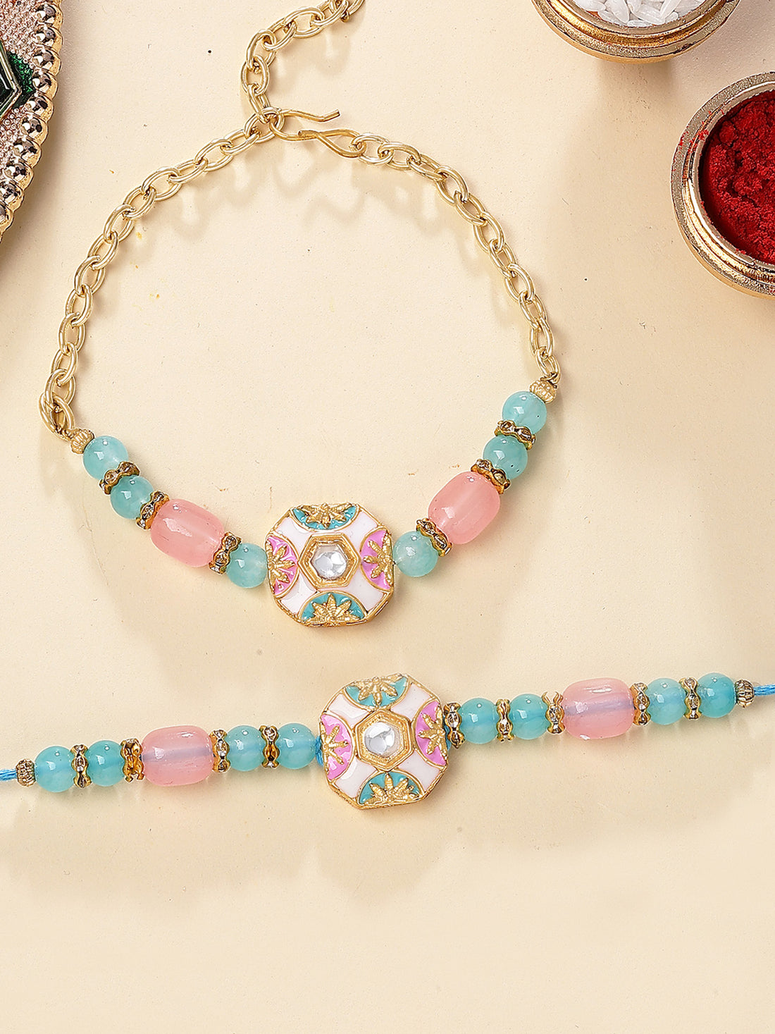 Karatcart Gold Plated Pink and Blue Beads Enamel Kundan Bhiya Bhabhi Rakhi with Roli & Chawal