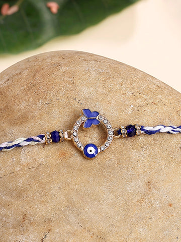 KARATCART Gold Plated Blue American Diamond Butterfly Shape Evil Eye Bhaiya Rakhi with Roli & Chawal