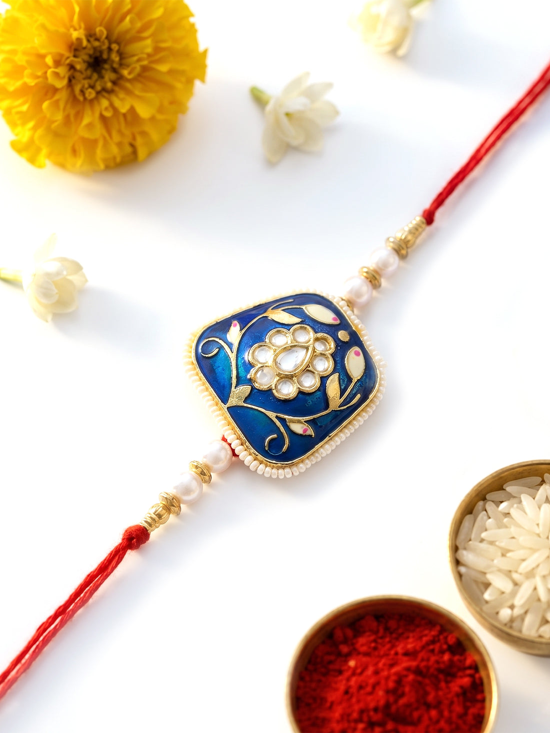 KARATCART Special Blue Meenakari Floral Design Handmade Rakhi for Brother with Roli Chawal