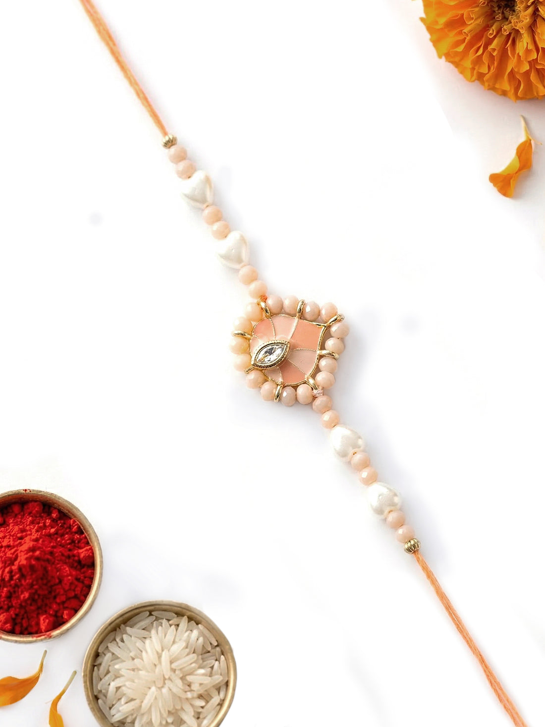 KARATCART Gold Plated Peach Heart Enamel Kundan Bhaiya Rakhi with Roli & Chawal