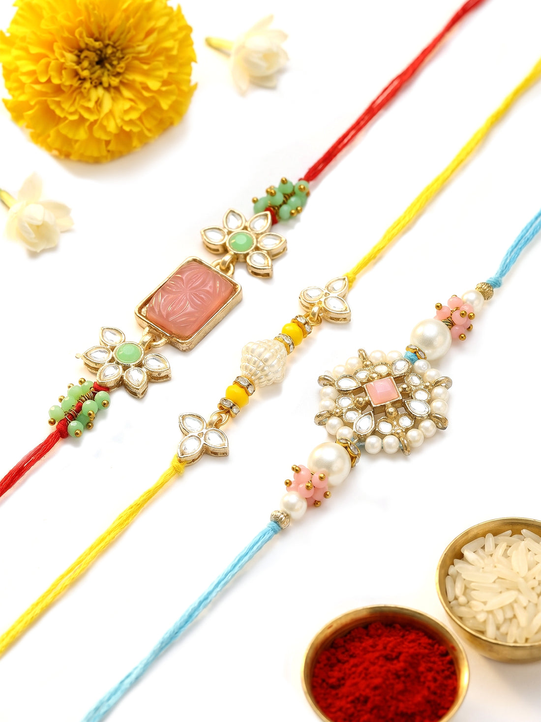 KARATCART Set of 3 Handmade Pink Carved Stone Kundan Rakhis for Brother with Roli & Chawal
