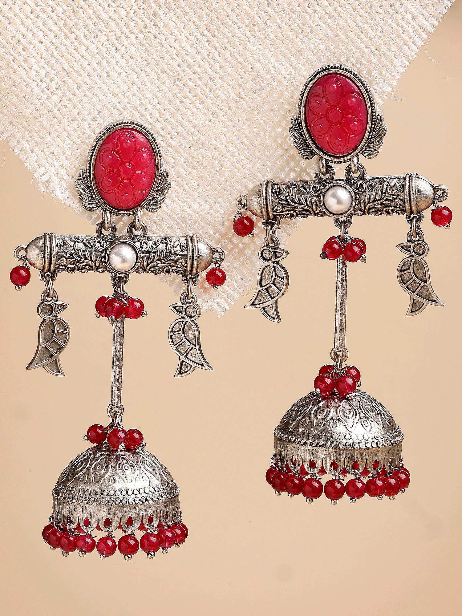 Karatcart Traditional Oxidized Silver Red Carved Stone Jhumka Earrings with Bird Motifs
