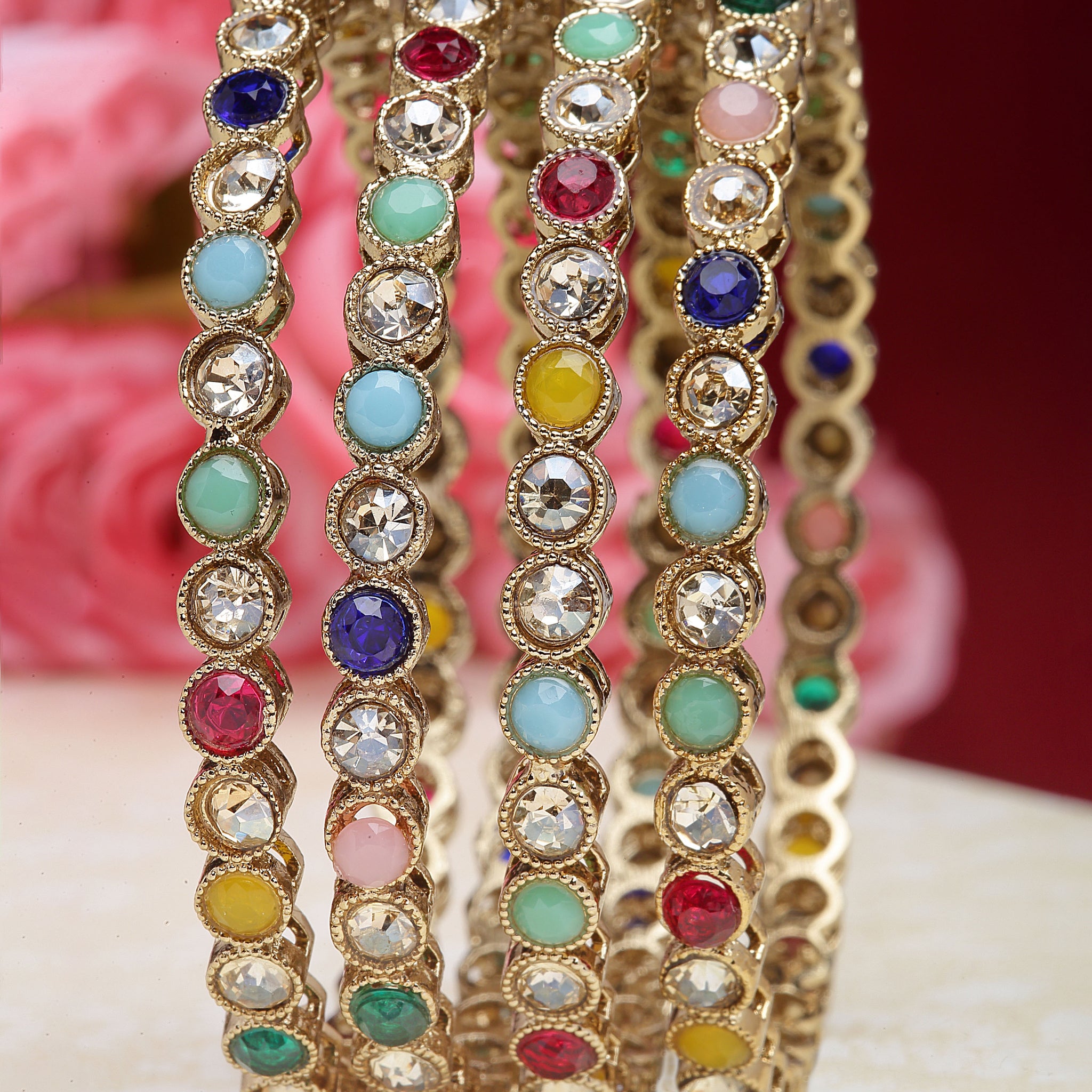 Karatcart Gold Plated Set of 4 Multicolor Stone Studded Bangles for Women