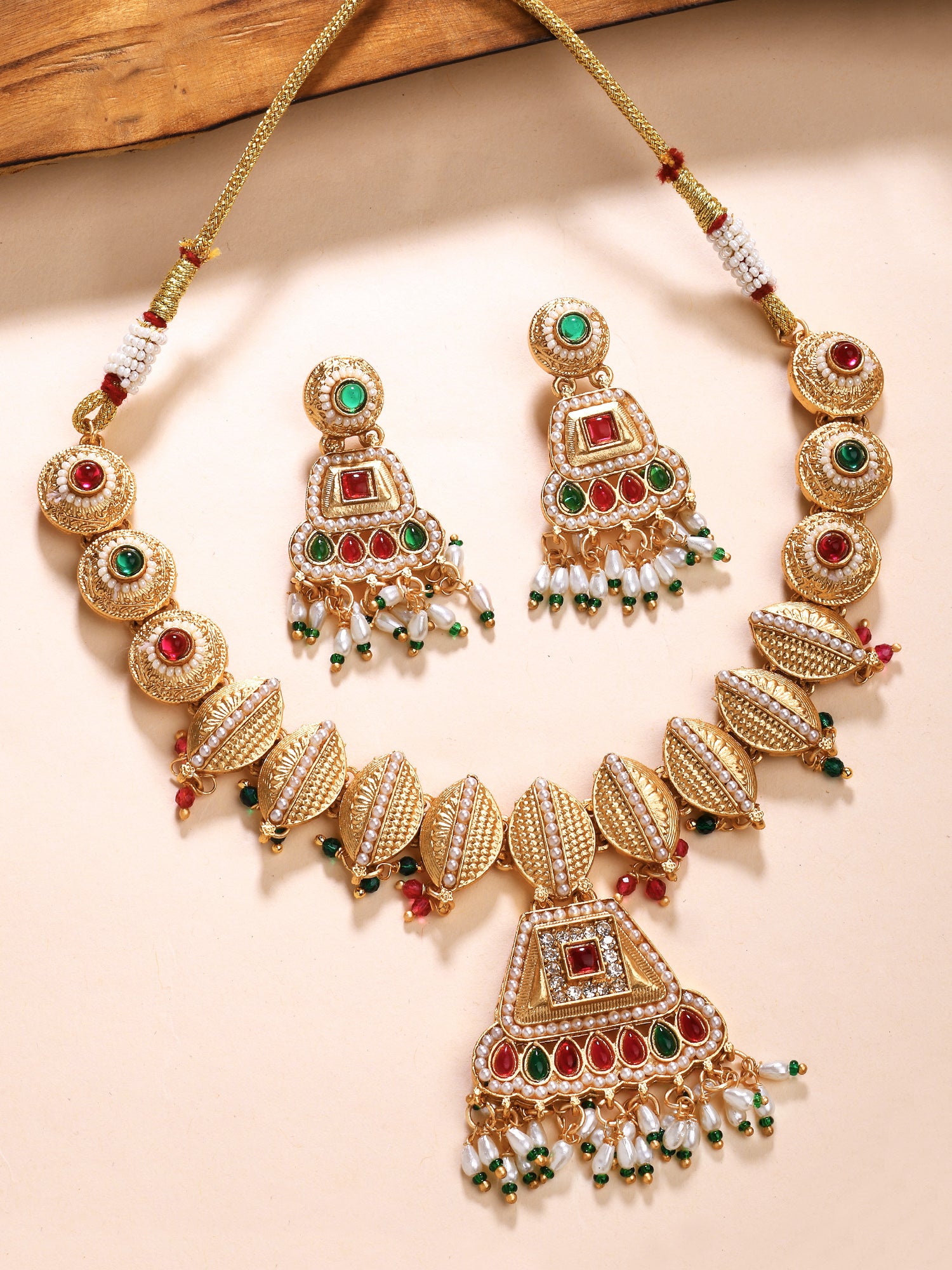 KARATCART Designer Gold-Plated Red and Green Crystal Choker Necklace Set for Women