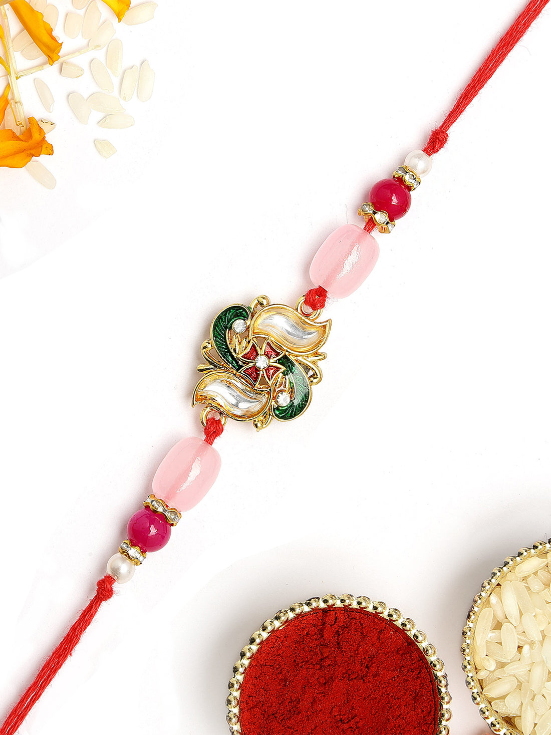 KARATCART Stylish Swastika Design Green Meena and Kundan Handmade Rakhi for Brother with Roli Chawal