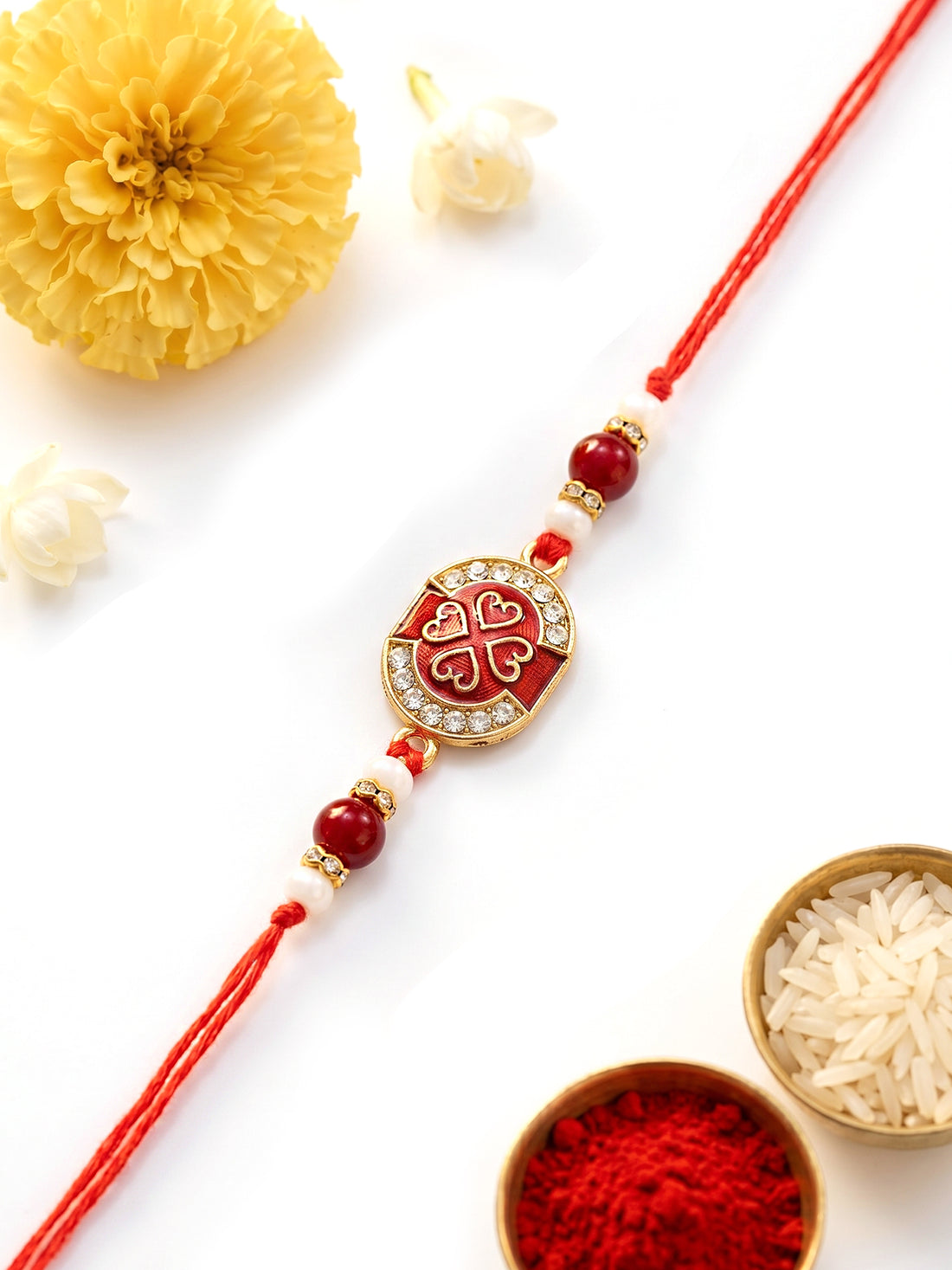 KARATCART Elegant Red Meena and Crystal Handmade Rakhi for Brother with Roli Chawal
