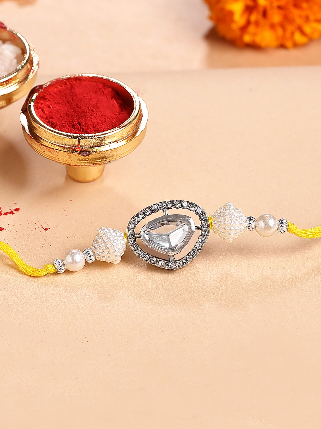 Karatcart White Beads Black Polki Kundan Bhiya Rakhi with Roli & Chawal