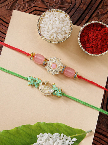 KARATCART Set of 2 Pink Stone and Green Fish Handmade Kundan Rakhi for Brother with Roli & Chawal
