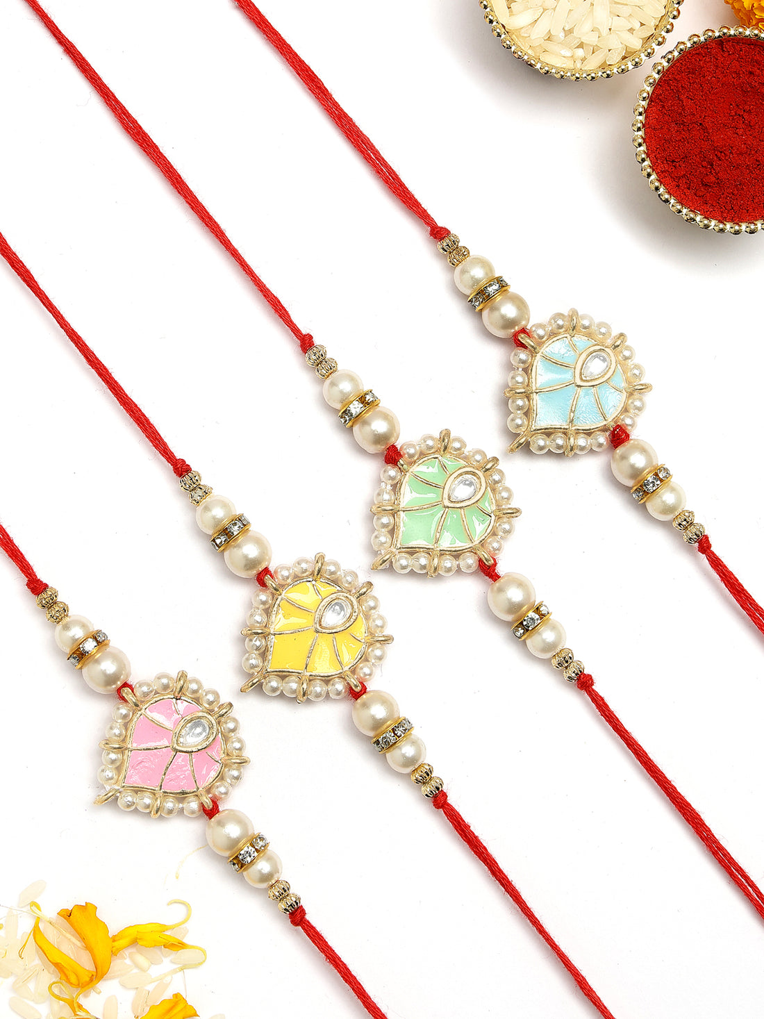 KARATCART Set of 4 Handmade Meenakari Heart Shape Kundan Rakhis for Brother with Roli and Chawal