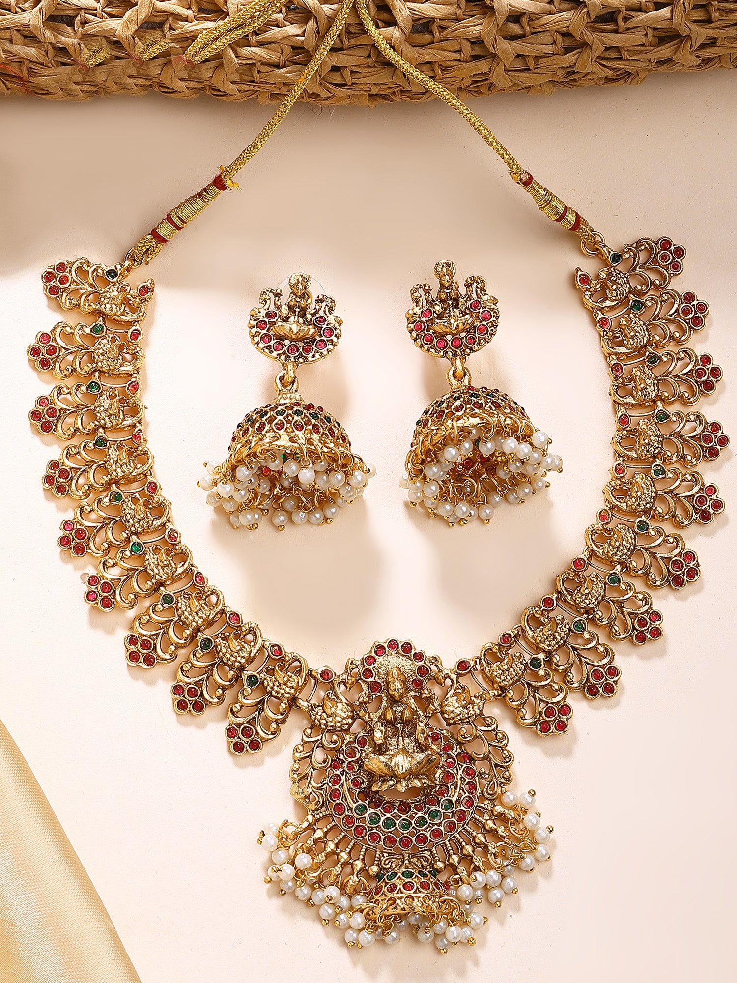 KARATCART Traditional Gold-Plated Laxmi Mata and Peacock Temple Jewellery Set for Women