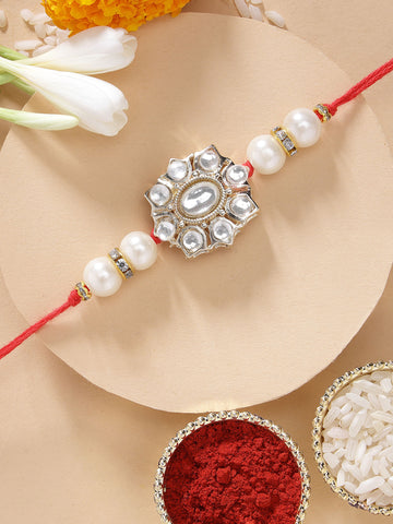KARATCART Stylish Floral Design Pearl and Kundan Rakhi for Brother with Roli & Chawal
