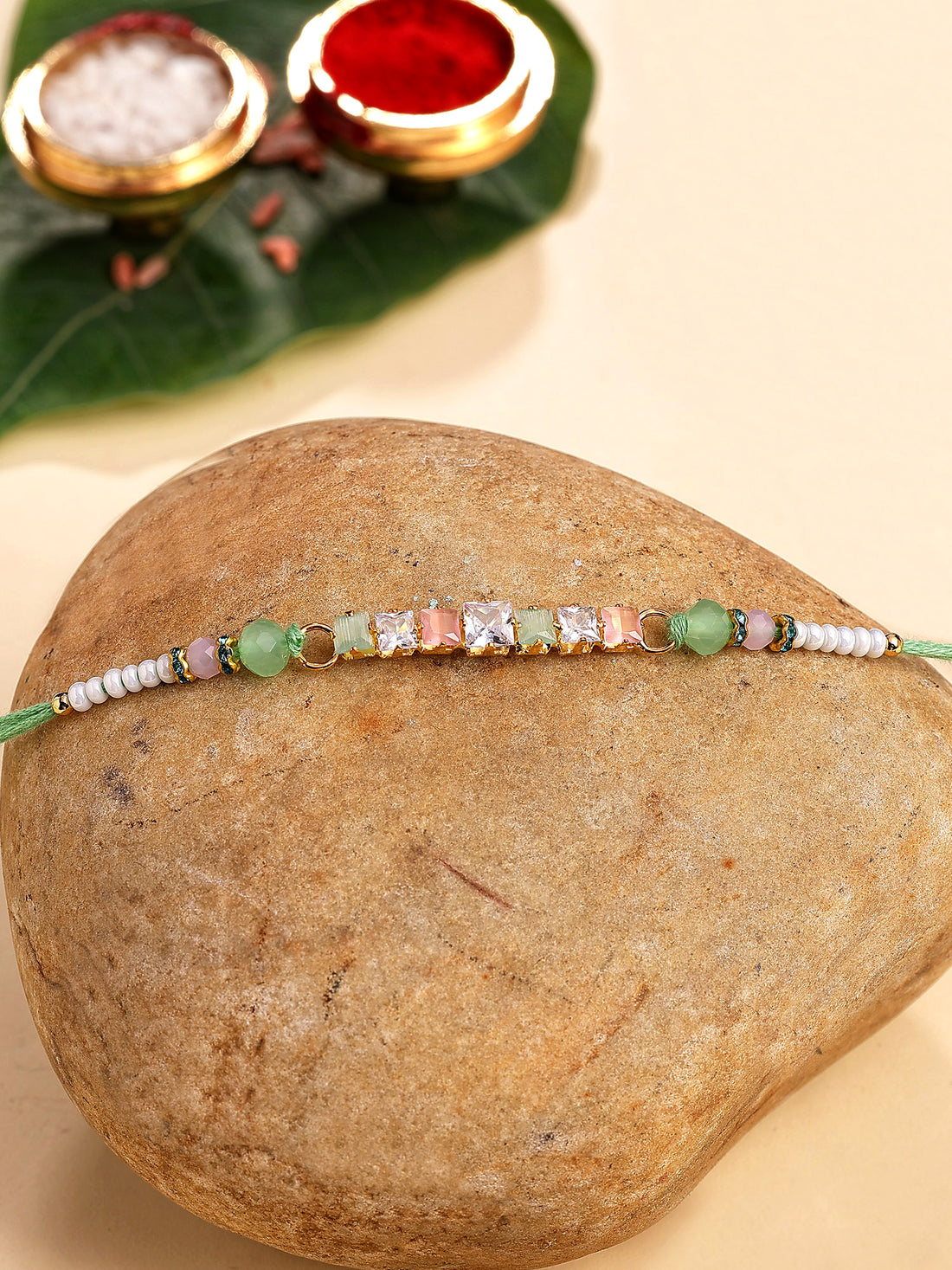 Karatcart Lime Green and Peach Rhinestones Bhiya Rakhi with Roli & Chawal