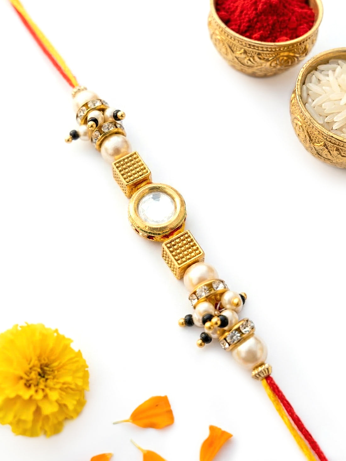 KARATCART Gold Plated Polki Kundan and Pearl Bhaiya Rakhi with Roli & Chawal