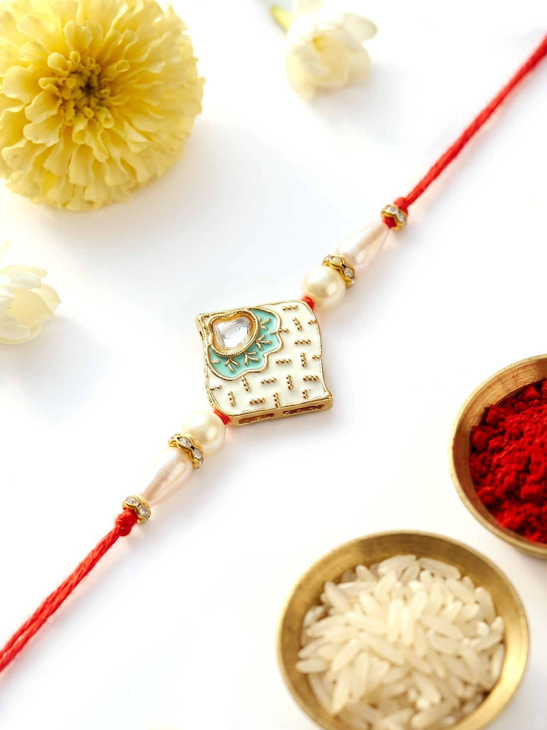 KARATCART Beautiful Sea Shell Design Meenakari Handmade Kundan Rakhi for Brother with Roli & Chawal