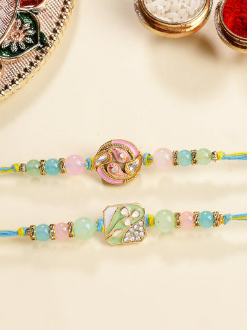 KARATCART Set of 2 Green and Pink Enamel Kundan Rakhi for Brother with Roli & Chawal