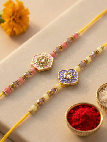 KARATCART Set of 2 Pink and Purple Floral Enamel Rakhi for Brother with Roli & Chawal