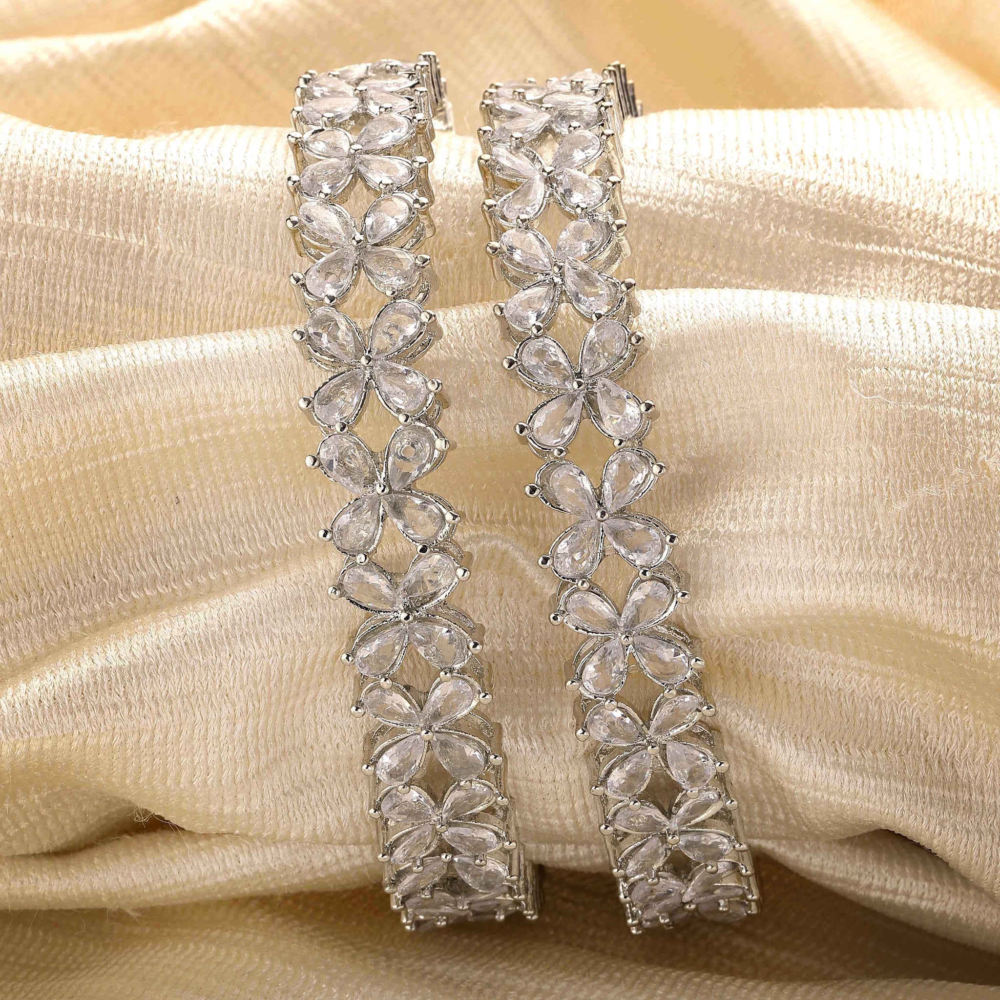 Karatcart Set of 2 American Diamond Studded Silver Plated Floral Bangles for Women