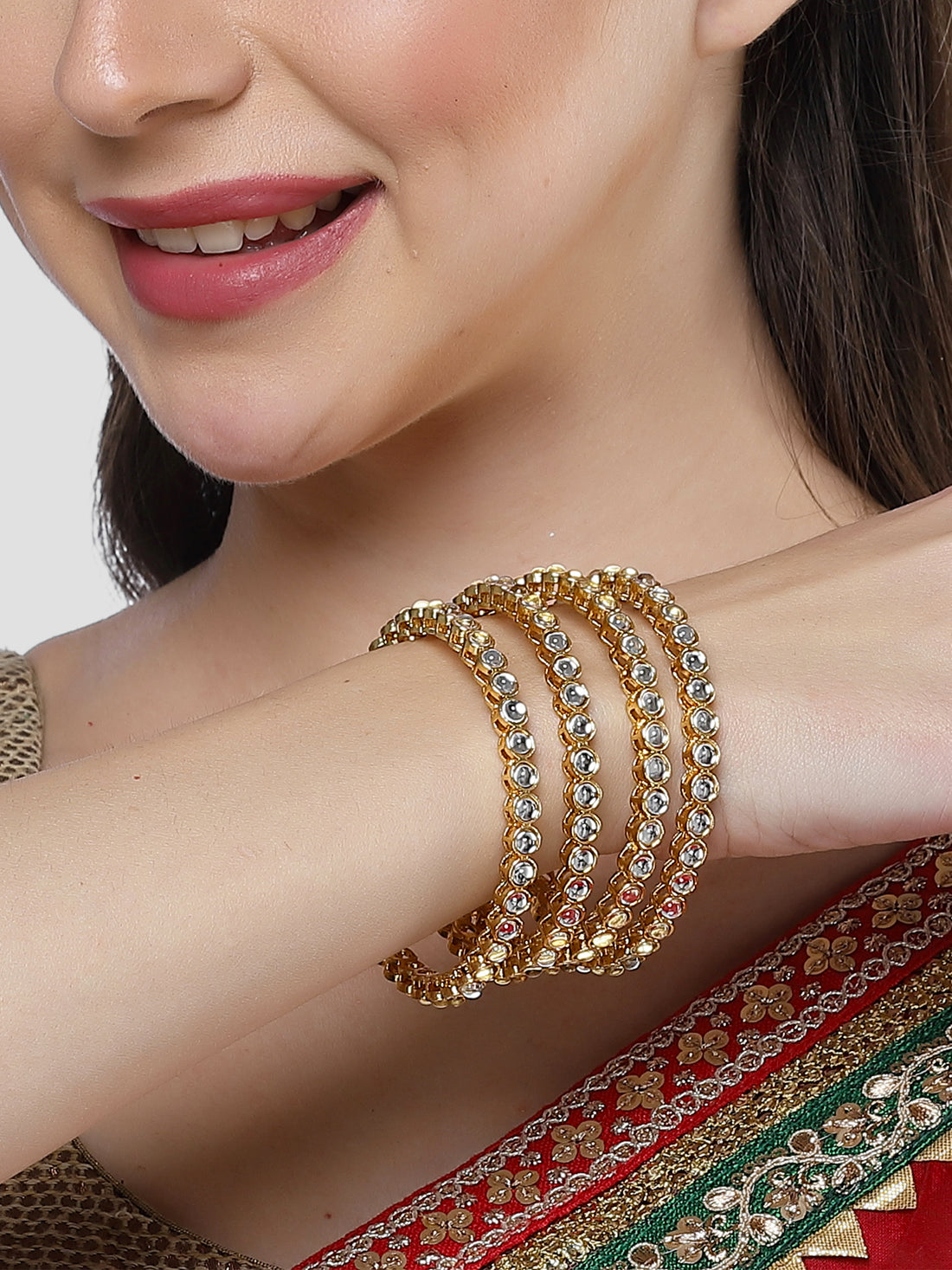 Karatcart Set of 4 Gold Plated Round Shape White Kundan Studded Bangles for Women
