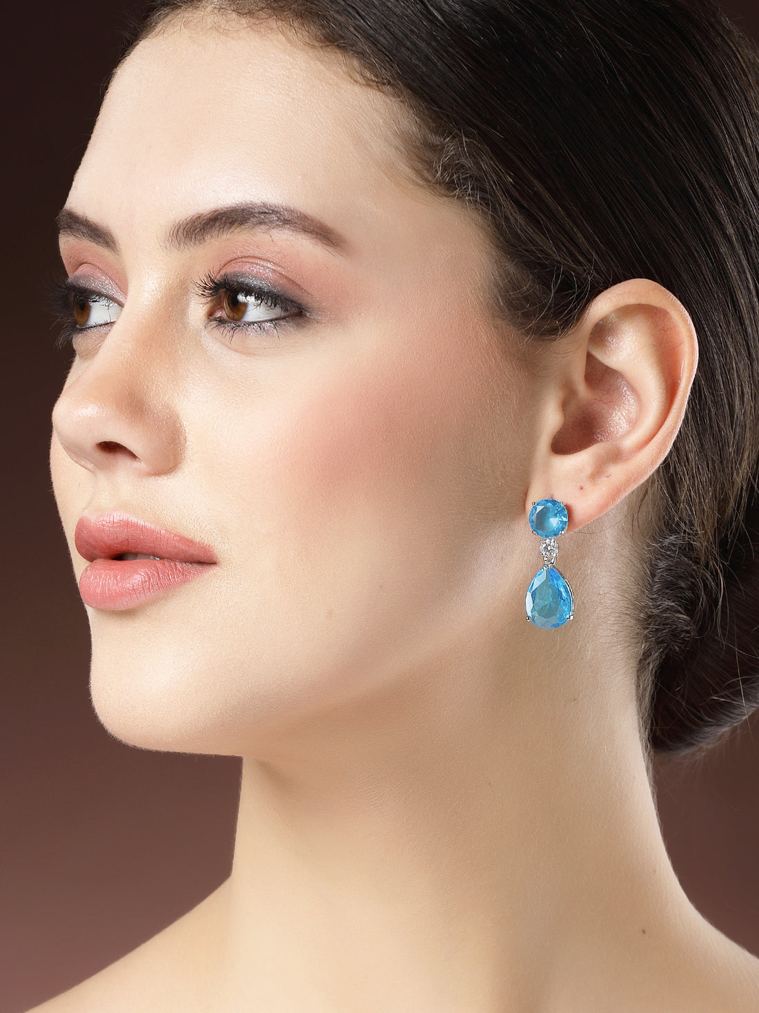 Karatcart Luxurious Light Blue American Diamond Stone Drop Earrings for Women