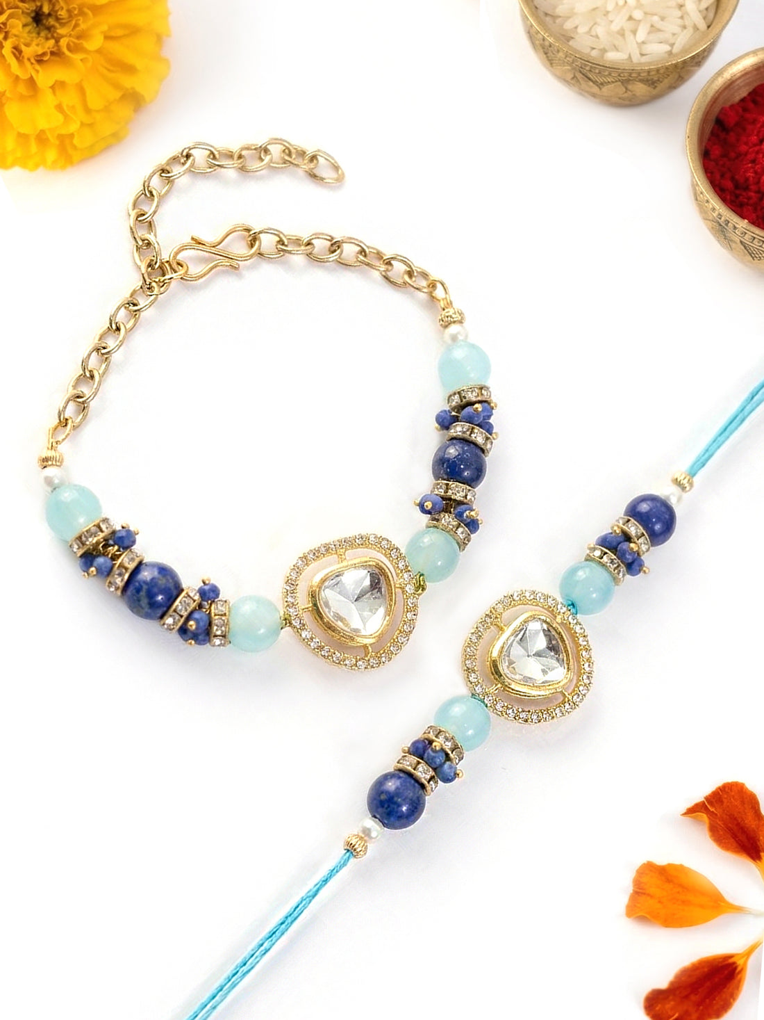KARATCART Gold Plated Aqua Blue Beads Polki Kundan Bhaiya Bhabhi Rakhi with Roli & Chawal
