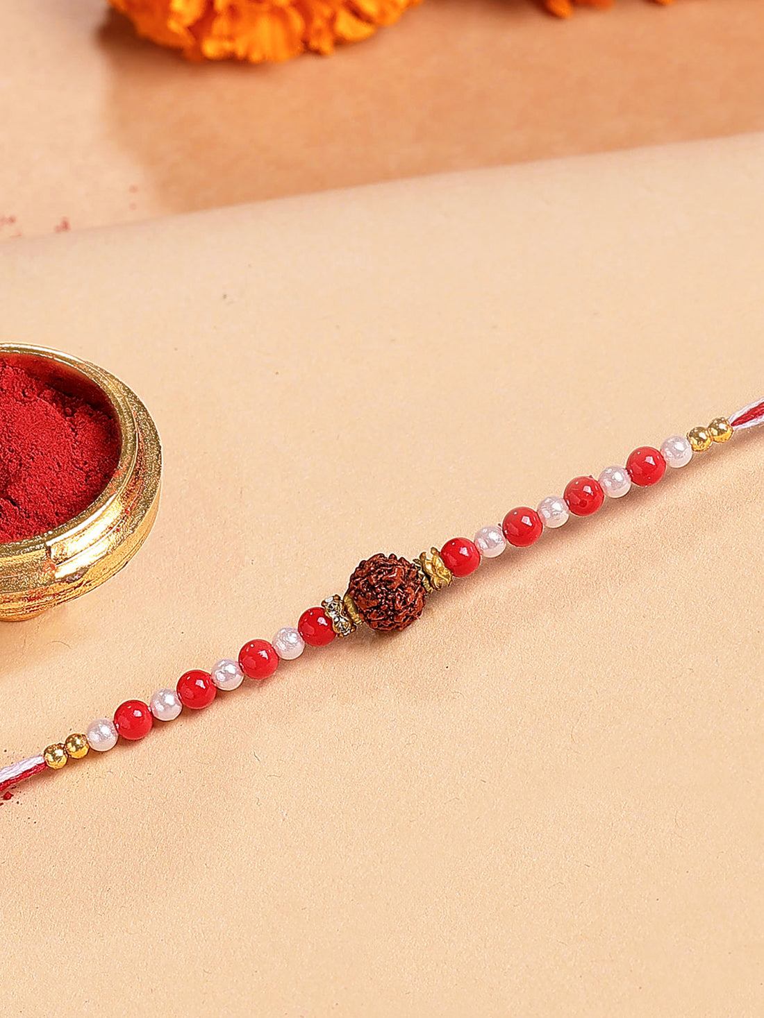 Karatcart Red and White Beads Rudraksha Bhiya Rakhi with Roli & Chawal