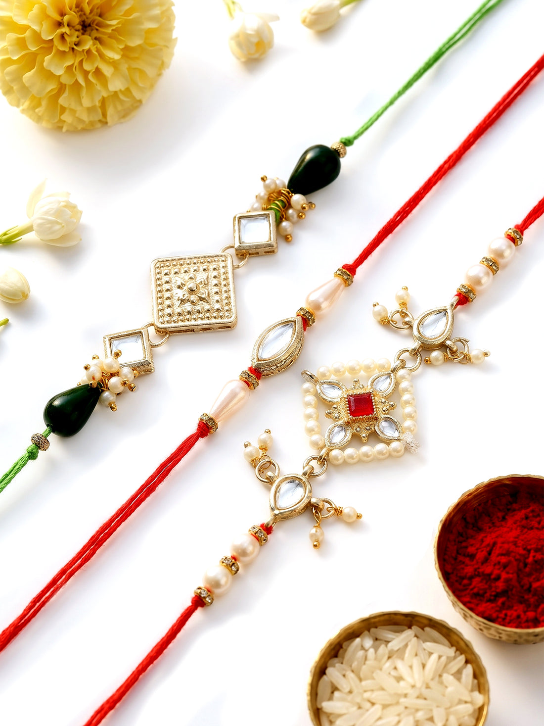 KARATCART Set of 3 Handmade Floral Design Pearl Kundan Rakhis for Brother with Roli & Chawal