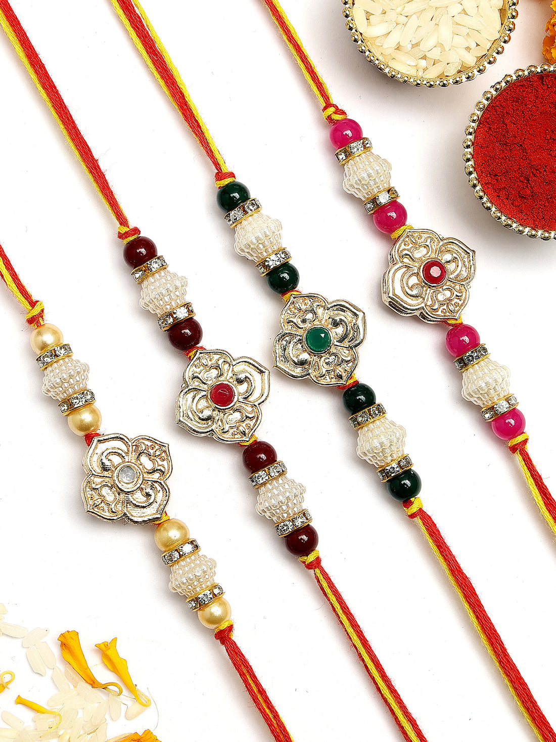 KARATCART Set of 4 Handmade Floral Design Multicolor Kundan Rakhis for Brother with Roli & Chawal