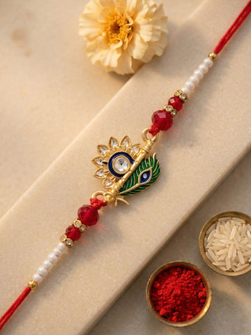 KARATCART Gold Plated Peacock Feather Floral Enamel Bhaiya Rakhi with Roli & Chawal