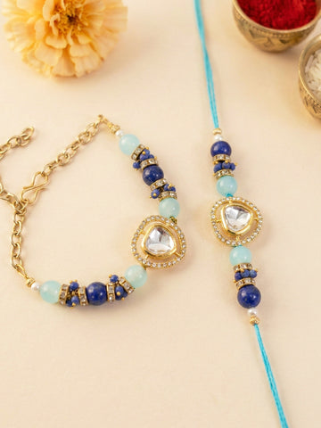 KARATCART Gold Plated Aqua Blue Beads Polki Kundan Bhaiya Bhabhi Rakhi with Roli & Chawal