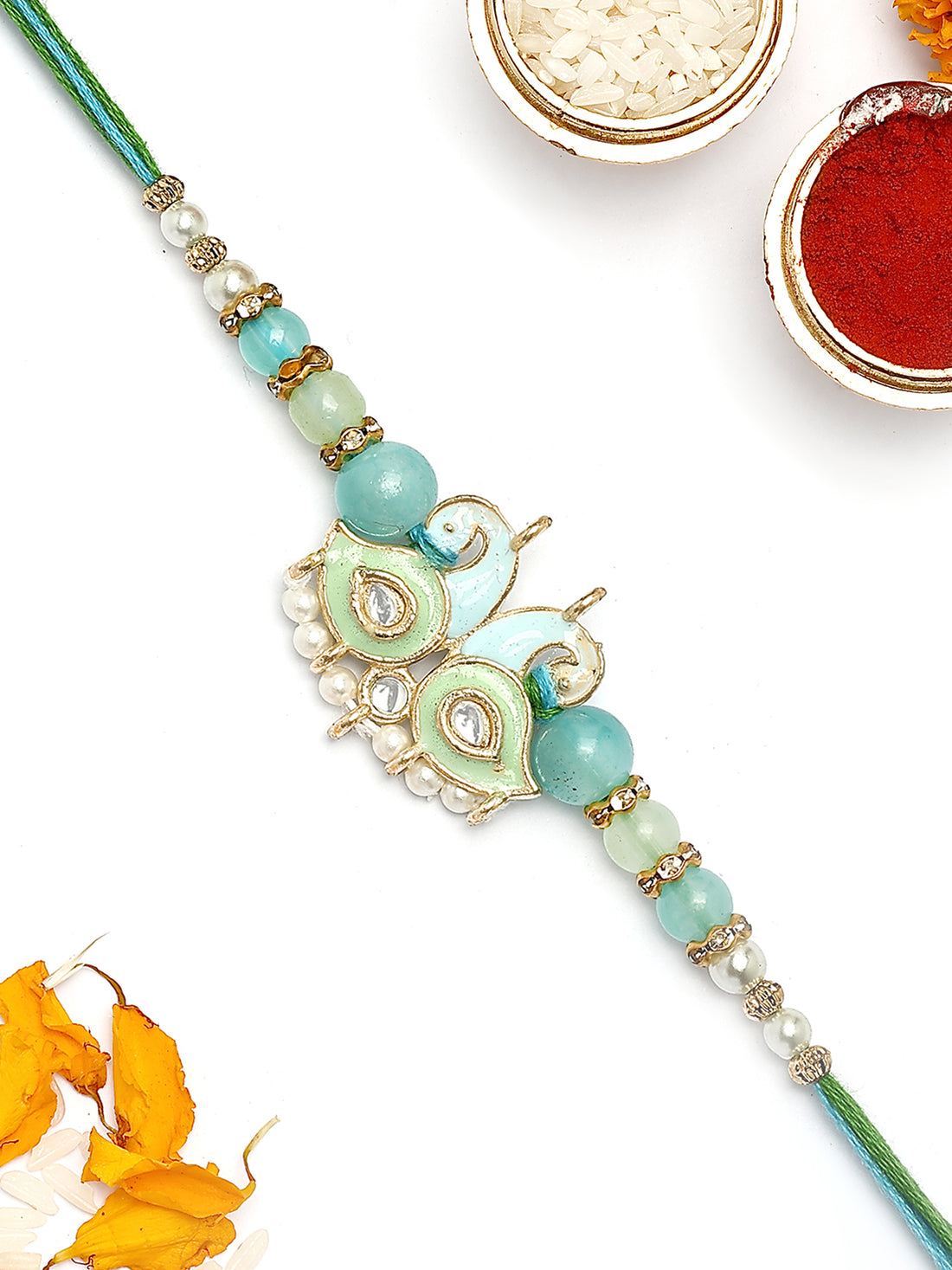 KARATCART Gold Plated Light Blue and Green Meena Kundan Bhaiya Rakhi with Roli & Chawal