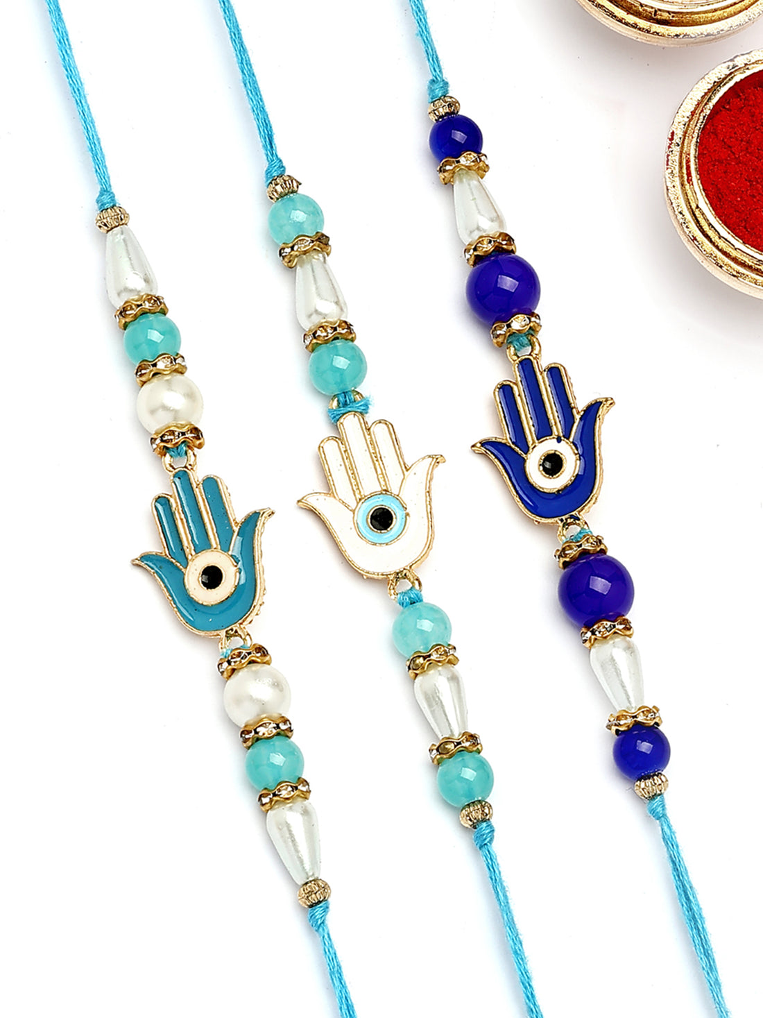 KARATCART Set of 3 White and Blue Enamel Hamsa Hand Evil Eye Rakhi for Brother with Roli & Chawal
